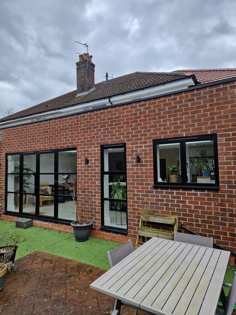 Heritage glazing set into a stone wall