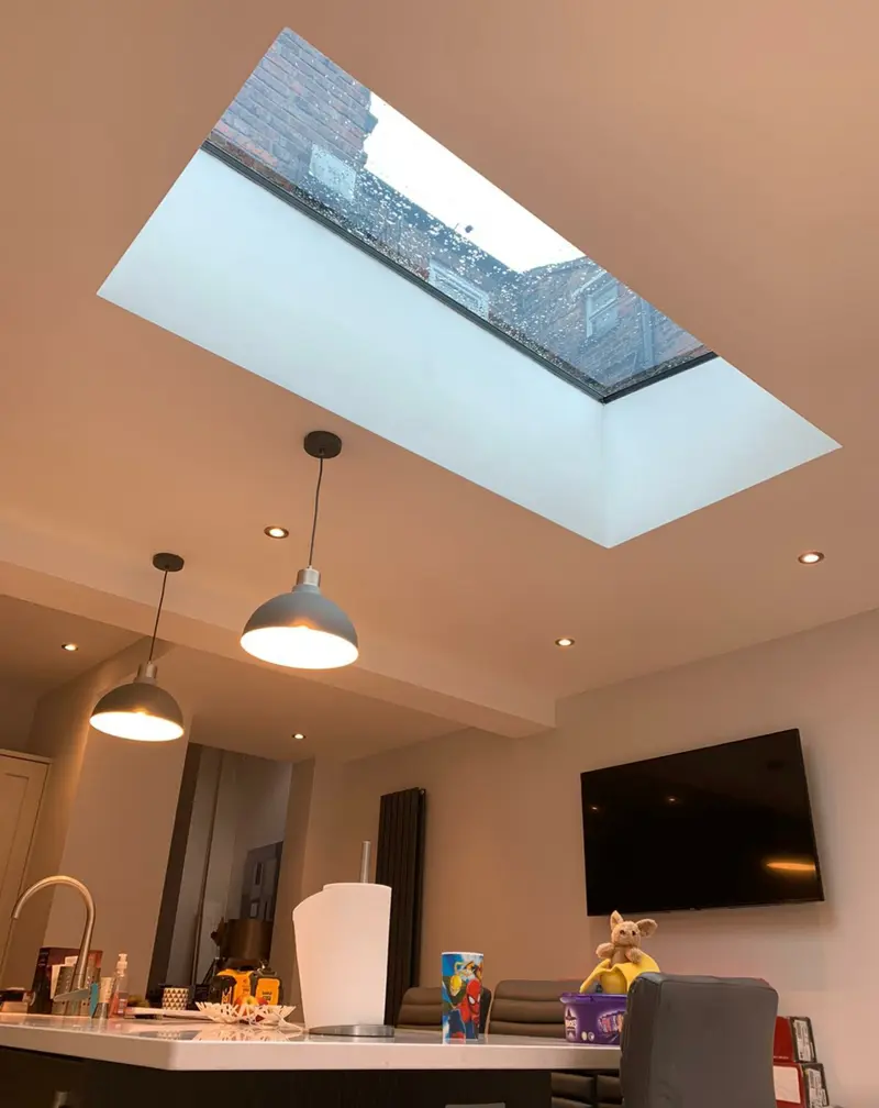 Flat rooflight in a brick extension